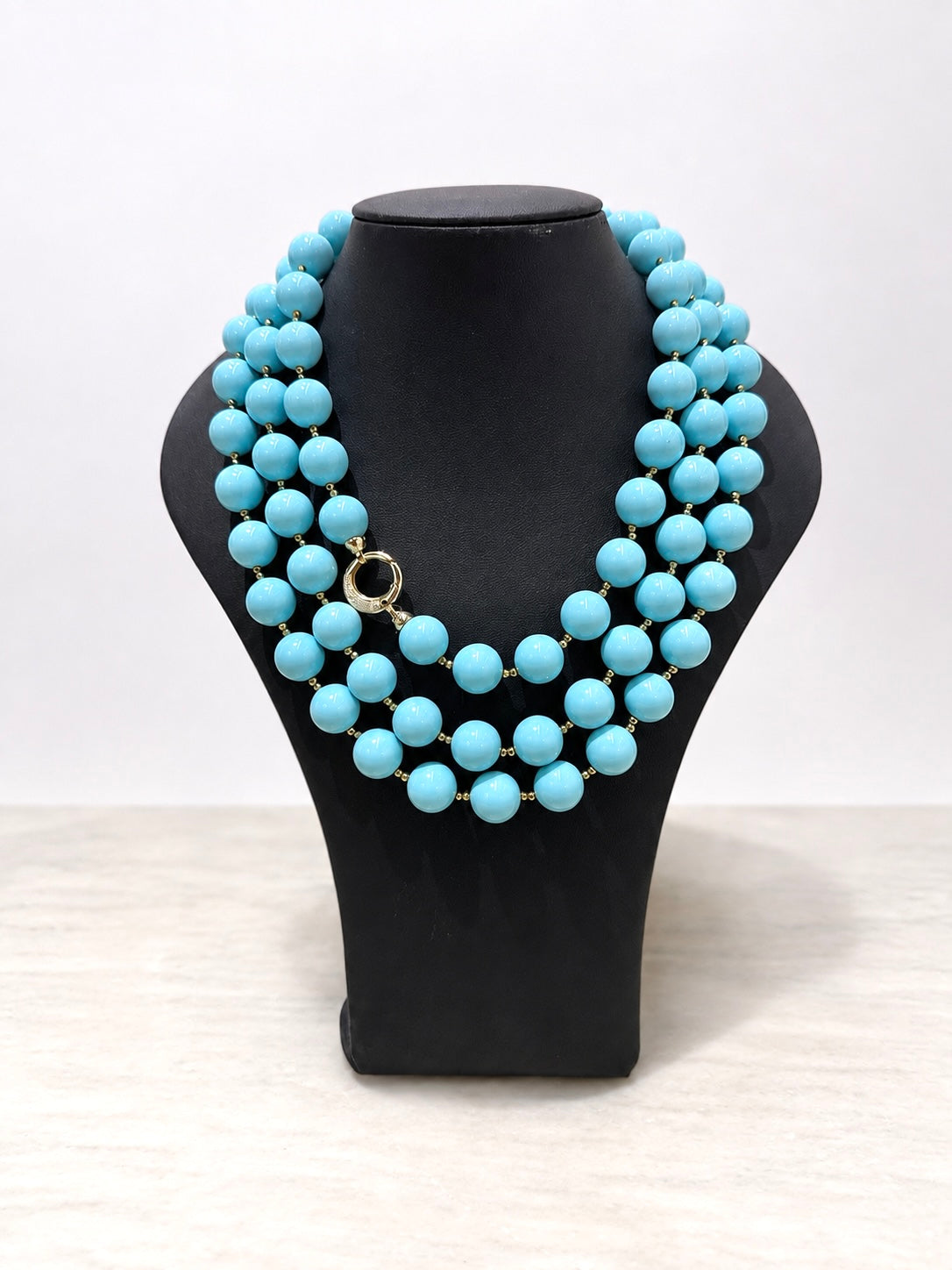 Collana artigianale in Argento 925 con pietre turchesi e chiusura decorativa.