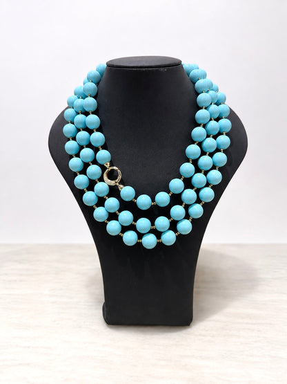 Collana artigianale in Argento 925 con pietre turchesi e chiusura decorativa.