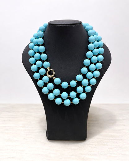 Collana artigianale in Argento 925 con pietre turchesi e chiusura decorativa.