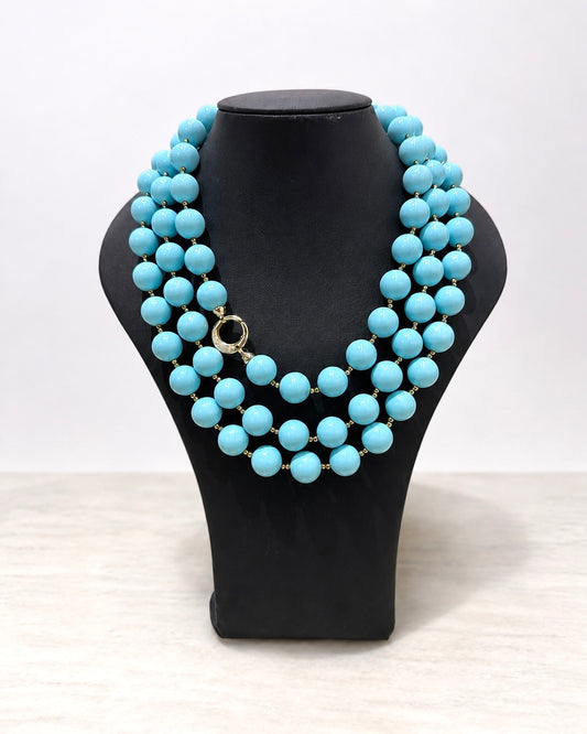Collana artigianale in Argento 925 con pietre turchesi e chiusura decorativa.
