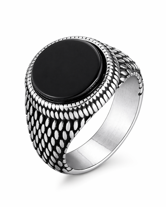 Anello in acciaio con pietra nera lucida e design texturizzato