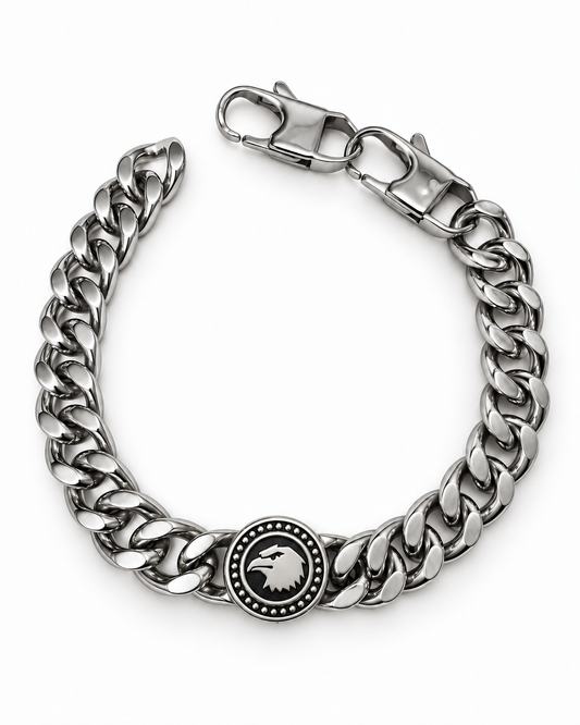 Bracciale Aquila in acciaio inox a maglia grumetta, con medaglione rotondo su fondo nero e chiusura a moschettone, su sfondo bianco.