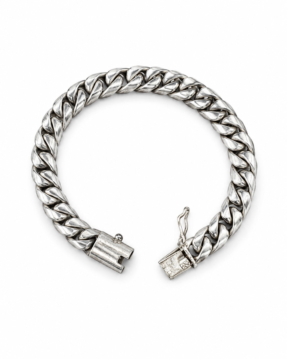 Bracciale Cuban Link uomo in Argento 925 con maglia intrecciata e chiusura decorata,  in stile casual luxury.
