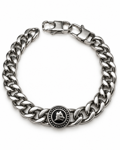 Bracciale Lupo in acciaio inox a maglia grumetta, con medaglione rotondo su fondo nero e chiusura a moschettone, su sfondo bianco.