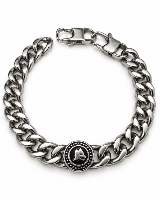 Bracciale Lupo in acciaio inox a maglia grumetta, con medaglione rotondo su fondo nero e chiusura a moschettone, su sfondo bianco.