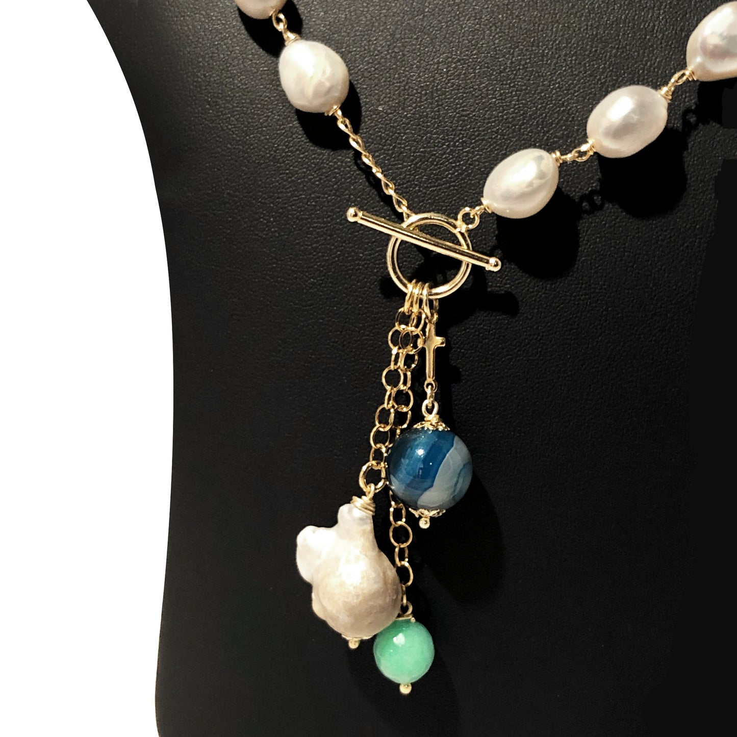 Fatta a mano in argento dorato con perle naturali, pietre dure e turchese chiusura a t